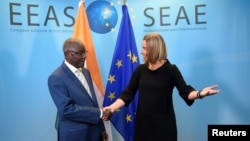 EU High Representative for Foreign Affairs Federica Mogherini welcomes Niger's Foreign Minister Kalla Ankourao before a G-5 Sahel Ministerial meeting at the EU headquarters in Brussels, Belgium, June 18, 2018. 
