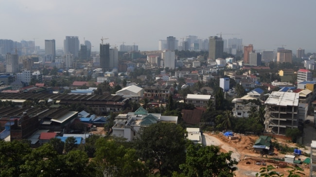 FILE - A general view shows residential and commercial buildings in the Cambodian port city of Sihanoukville on Feb. 20, 2020.
