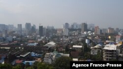 FILE - A general view shows residential and commercial buildings in the Cambodian port city of Sihanoukville on Feb. 20, 2020. 