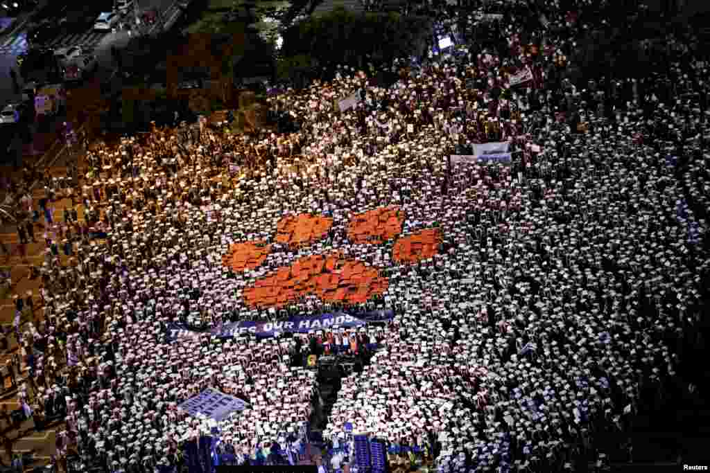 People take part in a protest for animal rights in Tel Aviv, Israel, Sept. 9, 2017.