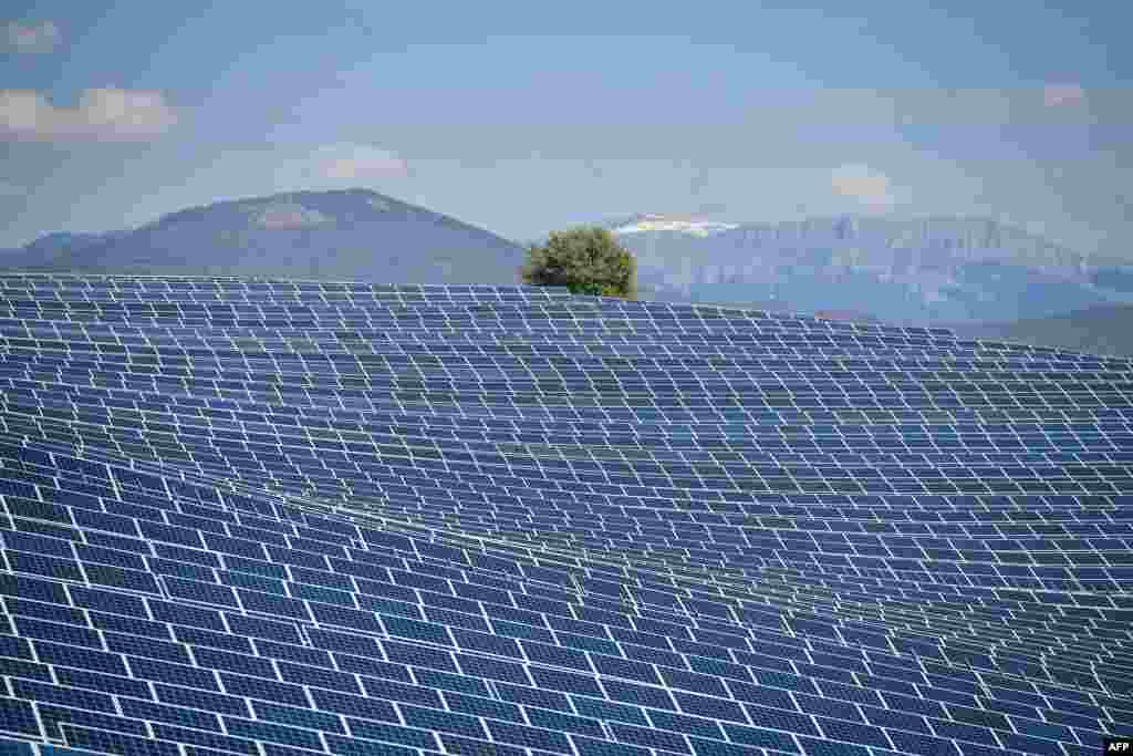 Photovoltaic solar panels are seen at the power plant in La Colle des Mees, Alpes de Haute Provence, southeastern France, April 17, 2019.