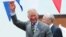 FILE - Britain's Prince Charles waves to the crowd during a visit to the harbour in Bridlington, northern England.
