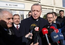 FILE - Turkey's President Recep Tayyip Erdogan speaks to journalists in Istanbul, Dec. 28, 2018.