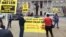 Demonstrators protest the death of Freddie Gray outside Baltimore City Hall, April 20, 2015. Gray died Sunday, a week after he was rushed to the hospital with spinal injuries following an encounter with four Baltimore police officers.