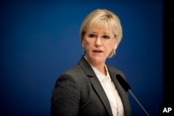 FILE - Sweden's Foreign Minister Margot Wallstrom, shown at a news conference in Stockholm in October 2014, told reporters at the U.N., “We have to send a signal about unity."