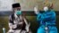 Tiêm chủng vaccine COVID-19 tại tỉnh Tây Java, Indonesia, ngày 15/6/2021. 