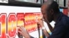 Until recently Kenya had banned any painting on Nairobi’s 10,000 matatus other than a standard yellow stripe, Nairobi, Jan. 23, 2015. (Hilary Heuler/for VOA)