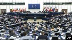 FILE - Polish Prime Minister Mateusz Morawiecki delivers a speech during a debate on the future of Europe, at the European Parliament in Strasbourg, eastern France, July 4, 2018.