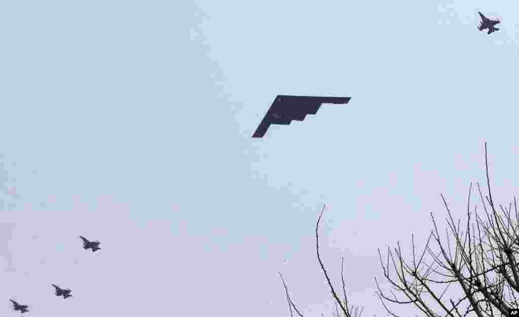 A U.S. Air Force B-2 stealth bomber flies near Osan U.S. Air Base in Pyeongtaek, south of Seoul, South Korea, March 28, 2013.