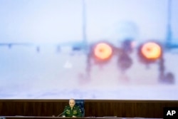 FILE - Lt.-Gen. Sergei Rudskoi of the Russian Military General Staff speaks to the media, in Moscow, Russia, March 18, 2016. Russia's Defense Ministry says its warplanes in Syria are supporting the Syrian army's offensive on Palmyra.