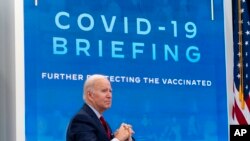 President Joe Biden meets with the White House COVID-19 Response Team in the South Court Auditorium in the Eisenhower Executive Office Building on the White House Campus in Washington, Jan. 4, 2022.