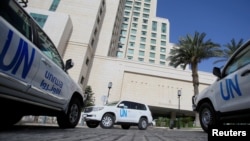 The United Nation vehicles carrying the Organisation for the Prohibition of Chemical Weapons (OPCW) inspectors is seen in Damascus, Syria, April 18, 2018.