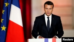 French President Emmanuel Macron delivers a speech during his inauguration at the handover ceremony at the Elysee Palace in Paris, May 14, 2017.