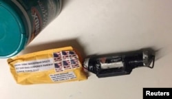 A package containing a "live explosive device," according to police, received at the Time Warner Center which houses the CNN New York bureau, in New York City, is shown in this handout picture provided Oct. 24, 2018.