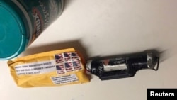 A package containing a "live explosive device," according to police, received at the Time Warner Center which houses the CNN New York bureau, in New York City, is shown in this handout picture provided Oct. 24, 2018.