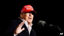 Former President Donald Trump speaks at a rally, Jan. 15, 2022, in Florence, Ariz.