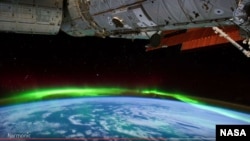 Screenshot of NASA's Ultra HD video of the Aurora Borealis phenomena as seen from the International Space Station. 