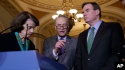 Senate Minority Leader Chuck Schumer of New York, center, joined by Sen. Dianne Feinstein, D-Calif., the ranking member of the Senate Judiciary Committee, and Sen. Mark Warner, D-Va., vice chair of the Intelligence Committee, calls for an investigation into President Donald Trump's administration over its relationship with Russia, during a news conference on Capitol Hill in Washington, Feb. 15, 2016. 