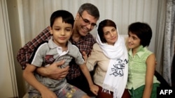 FILE - Reza Khandan, left, and his wife, Nasrin Sotoudeh, one of Iran’s most prominent human rights lawyers, in Tehran, Sept. 18, 2013.