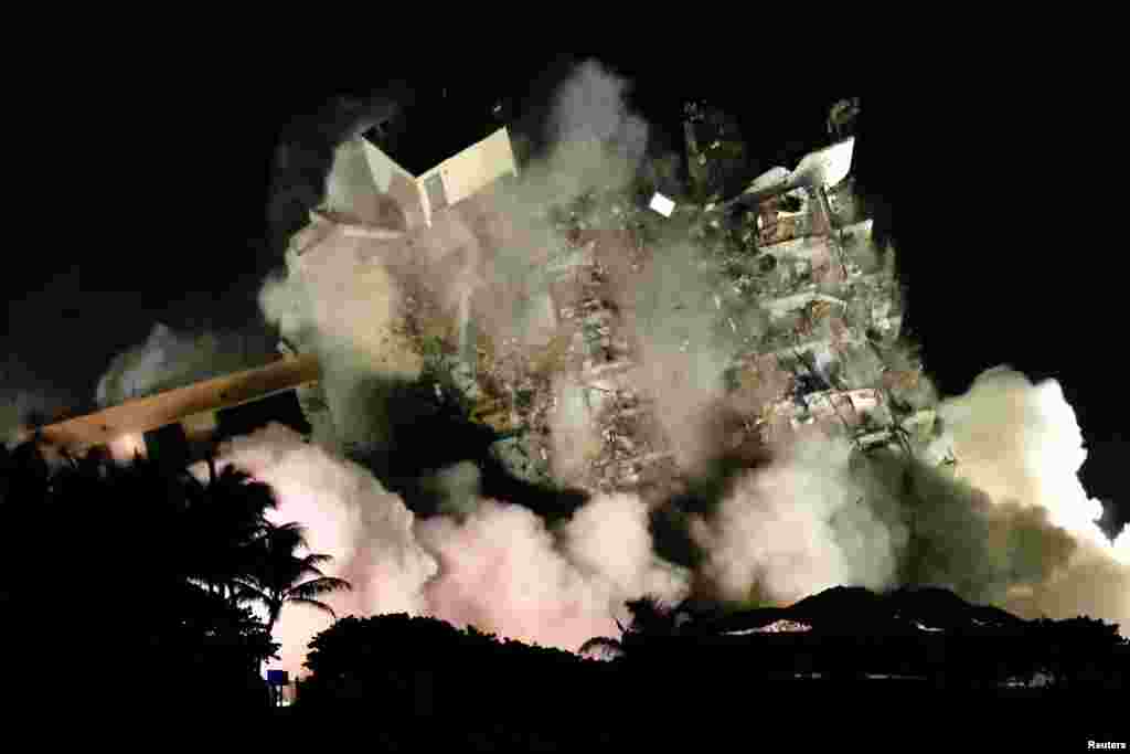 The partially collapsed Champlain Towers South residential building is demolished in Surfside, Florida, July 4, 2021.