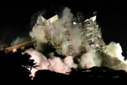 The partially collapsed Champlain Towers South residential building is demolished in Surfside, Florida, U.S., July 4, 2021. Picture taken July 4, 2021.