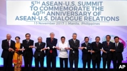 Leaders from left to right, Malaysia's Prime Minister Najib Razak, Myanmar's State Councellor and Foreign Minister Aung San Suu Kyi, Thailand's Prime Minister Prayut Chan-ocha, Vietnam's Prime Minister Nguyen Xuan Phuc, U.S. President Donald Trump, Philip