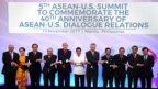 Leaders from left to right, Malaysia's Prime Minister Najib Razak, Myanmar's State Councellor and Foreign Minister Aung San Suu Kyi, Thailand's Prime Minister Prayut Chan-ocha, Vietnam's Prime Minister Nguyen Xuan Phuc, U.S. President Donald Trump, Philippine President Rodrigo Duterte, Singapore's Prime Minister Lee Hsien Loong, Brunei's Sultan Hassanal Bolkiah, Cambodia's Prime Minister Hun Sen, Indonesia's President Joko Widodo and Laos Prime Minister Thongloun Sisoulith, pose for a family photo during the ASEAN-US Summit in Manila on Monday Nov. 13, 2017. 