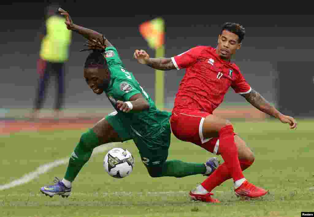 Sierra Leone&#39;s Osman Kakay in action with Equatorial Guinea&#39;s Jose Antonio Miranda in Cameroon on Jan. 20, 2022.