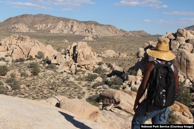 A hiker along the Hidden Valley trail, Joshua Tree National Park