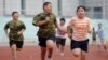 Trẻ em tập thể dục trong một trại hè giảm cân ở Thẩm Dương, tỉnh Liêu Ninh, Trung Quốc.