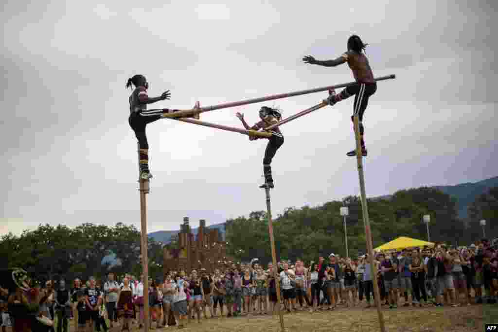 Togolese stilt walker group &quot;Afuma&quot; performs during the 41st edition of Paleo in Nyon, the biggest open-air music festival in Switzerland, July 20, 2016 .