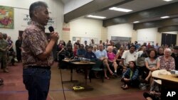  Hawaii Gov. David Ige speaks at a community meeting, May 7, 2018, in Pahoa, Hawaii. 