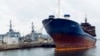 FILE - A Tanzania-flagged vessel, intercepted by the French navy in international waters between Sardinia in Italy and Algeria, is seen moored in the naval base of Toulon, southern France, Oct. 15, 2013.