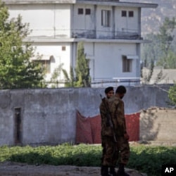 Soldiers keep guard around a compound within which al Qaeda leader Osama bin Laden was killed in Abbottabad May 3, 2011