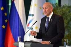 FILE - Slovenia's Prime Minister Janez Jansa delivers a speech during a press conference at the Brdo Congress Centre, near Ljubljana, Oct. 6, 2021.