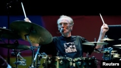 FILE - Drummer Ginger Baker of the Legendary supergroup Cream performs during a concert at the Royal Albert Hall in London, May 2, 2005.