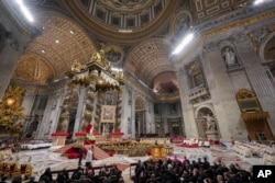 Pope Francis presides over the Christmas Eve Mass in St. Peter's Basilica at The Vatican, Dec. 24, 2024, after opening the basilica's holy door marking the start of the Catholic jubilar year 2025.