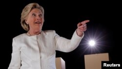 U.S. Democratic presidential nominee Hillary Clinton walks offstage at a campaign rally in Sanford, Florida, Nov. 1, 2016.