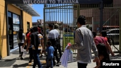 Migrantes centroamericanos regresados a México en Tijuana, México, el 18 de julio de 2019.