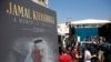 A picture of slain Saudi dissident and Washington Post columnist Jamal Kashoggi is seen during a ceremony near Saudi Arabia's consulate in Istanbul, Turkey, marking the one-year anniversary of his death, Oct. 2, 2019. 