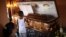 A boy looks at the coffin holding the body of Candido Rios Vazquez, a journalist for the Diario de Acayucan newspaper, who was murdered in Hueyapan de Ocampo in Veracruz state, Mexico, Aug. 23, 2017. Rios reportedly had been threatened repeatedly since 2012 by a former mayor of Hueyapan de Ocampo.