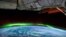 Screenshot of NASA's Ultra HD video of the Aurora Borealis phenomena as seen from the International Space Station. 