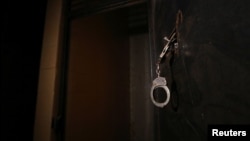 Handcuffs are pictured inside a prison, which according to Syria Democratic Forces (SDF) fighters belonged to Islamic State militants, in Manbij, Aleppo Governorate, Syria.