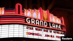 FILE - The marquee of the Grand Lake Theater is seen during the opening of the final chapter of the Skywalker saga 'Star Wars: The Rise of Skywalker' in Oakland, California, Dec. 19, 2019.