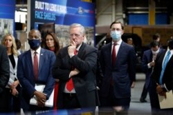 From left, White House press secretary Kayleigh McEnany, HUD Secretary Ben Carson, White House chief of staff Mark Meadows&nbsp;and White House senior adviser Jared Kushner tour Ford's Rawsonville Components Plant in Ypsilanti, Mich., May 21, 2020.