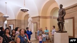 FILE - A statue of Confederate commanding general Robert E. Lee is seen in the crypt of the U.S. Capitol in Washington, Aug. 24, 2017.