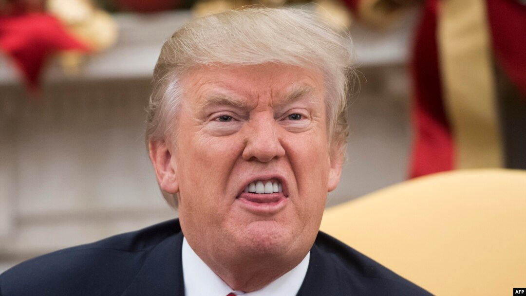 Presiden Donald Trump saat berbicara mengenai reformasi pajak di Gedung Putih, Washington DC, 5 Desember 2017. (Foto: Saul Loeb/AFP)