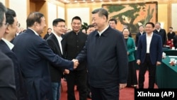 Chinese President Xi Jinping meets with representatives of private entrepreneurs in Beijing on Feb. 17, 2025. (Xinhua News Agency via AP)