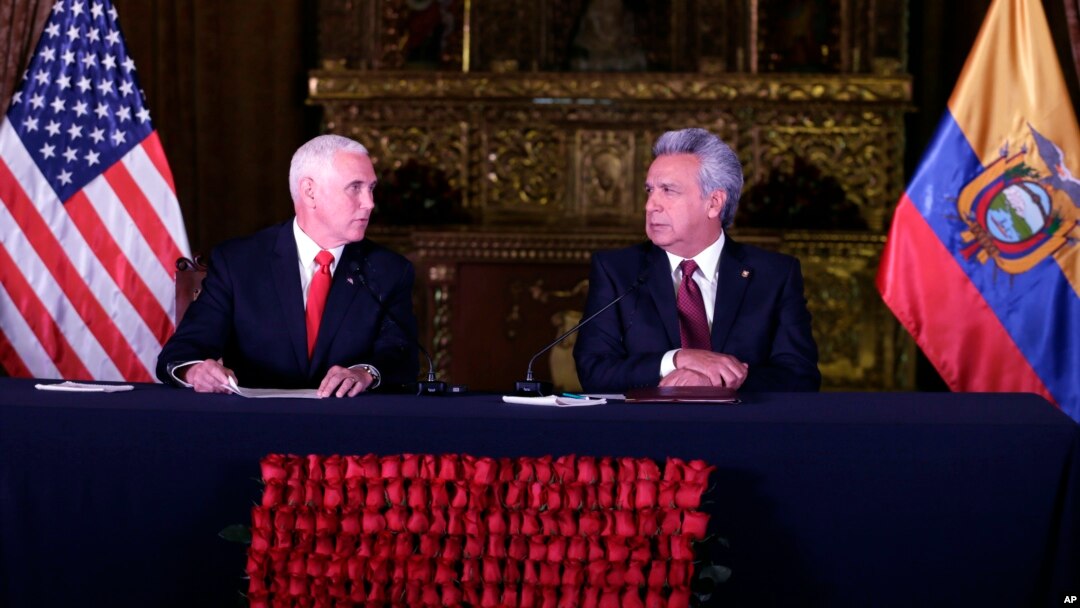 U.S. Vice President Mike Pence, left, and Ecuador's President Lenin Moreno exchange looks during the delivery of a final statement at the government palace in Quito, Ecuador, June 28, 2018.
