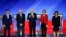 From left, Democratic presidential candidates Pete Buttigieg, Sen. Bernie Sanders, Joe Biden, Elizabeth Warren, and Amy Klobuchar, are seen ahead of their primary debate at Saint Anselm College in Manchester, New Hampshire, Feb. 7, 2020. 